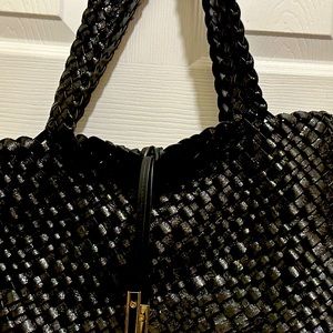 Gently used Calvin Kline black tweed leather.